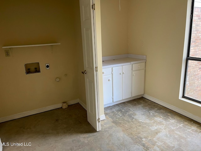 washroom featuring cabinets, washer hookup, and electric dryer hookup