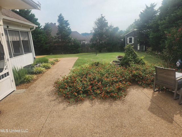 view of yard with fence