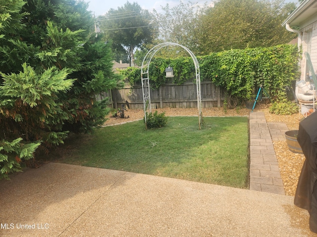 view of yard with fence