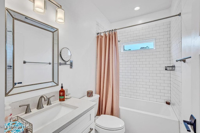 full bathroom with vanity, shower / bathtub combination with curtain, and toilet