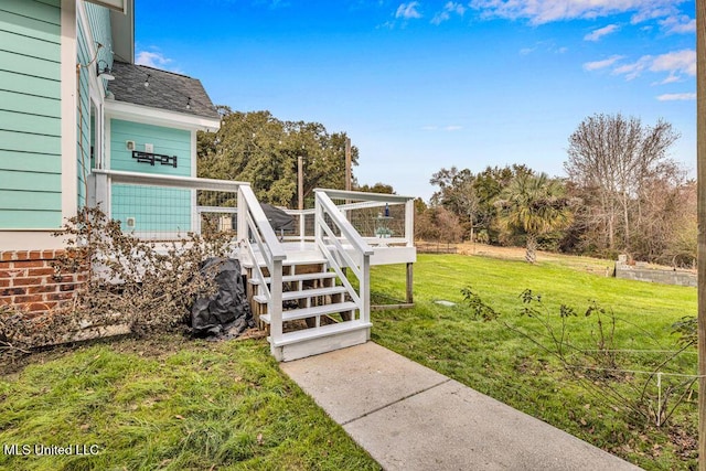 view of yard featuring a deck