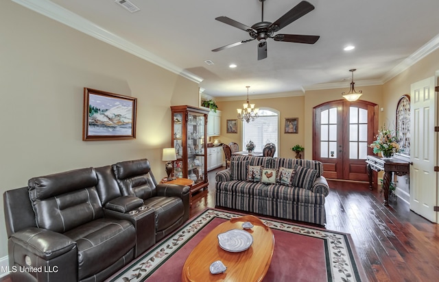 living room featuring ceiling fan with notable chandelier, dark hardwood / wood-style floors, crown molding, and french doors