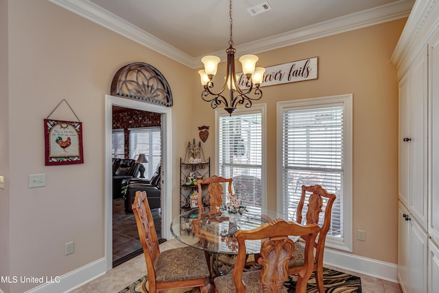 tiled dining room with an inviting chandelier and ornamental molding