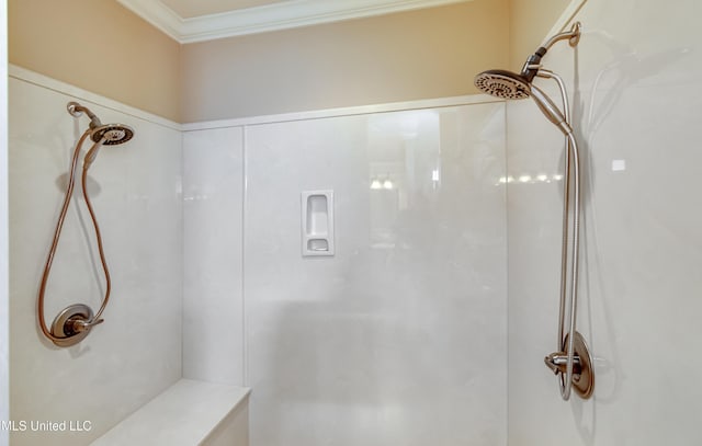 bathroom featuring crown molding and walk in shower