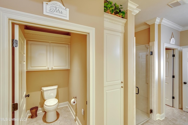 bathroom with tile patterned floors, crown molding, an enclosed shower, and toilet