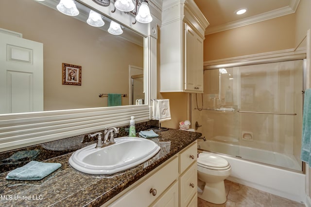 full bathroom with vanity, combined bath / shower with glass door, tile patterned flooring, toilet, and ornamental molding