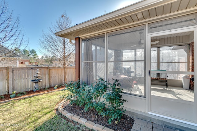 entrance to property with a yard