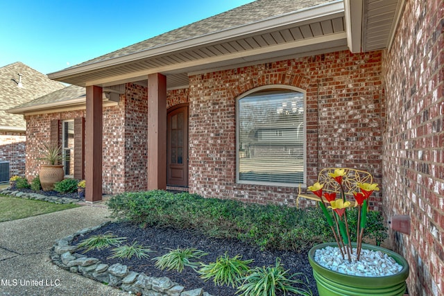 view of exterior entry featuring central AC