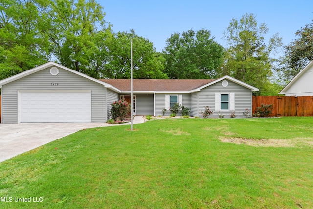 7829 Alawai Ave, Diamondhead, MS 39525 - ranch-style home featuring driveway, an attached garage, fence, and a front lawn