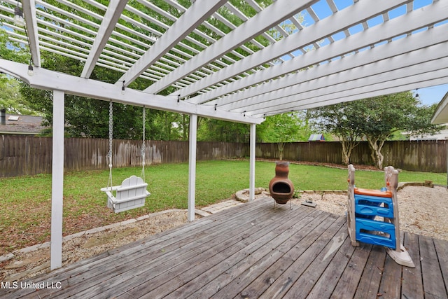 7829 Alawai Ave, Diamondhead, MS 39525 - wooden deck with a fenced backyard, a lawn, and a pergola