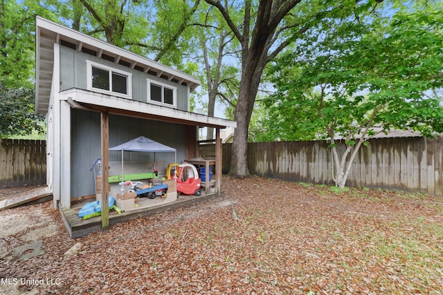 7829 Alawai Ave, Diamondhead, MS 39525 - rear view of house with a fenced backyard