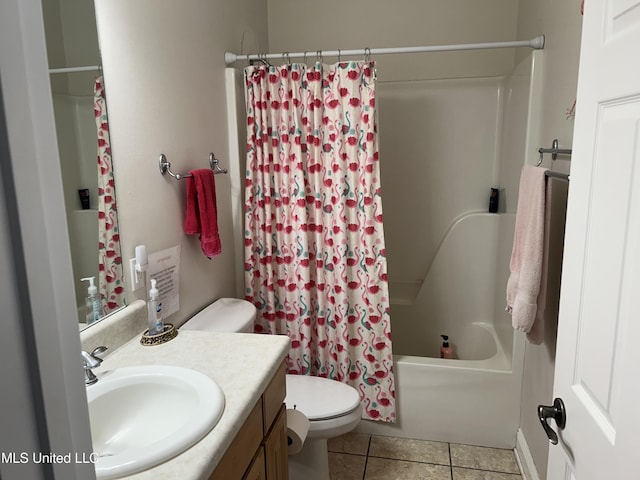 full bathroom featuring vanity, tile patterned flooring, toilet, and shower / tub combo with curtain