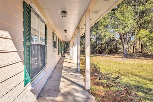 view of patio featuring a porch