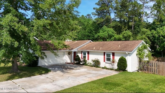 1334 Diller Rd, Ocean Springs, MS 39564 - ranch-style home featuring an attached garage, driveway, and a shingled roof