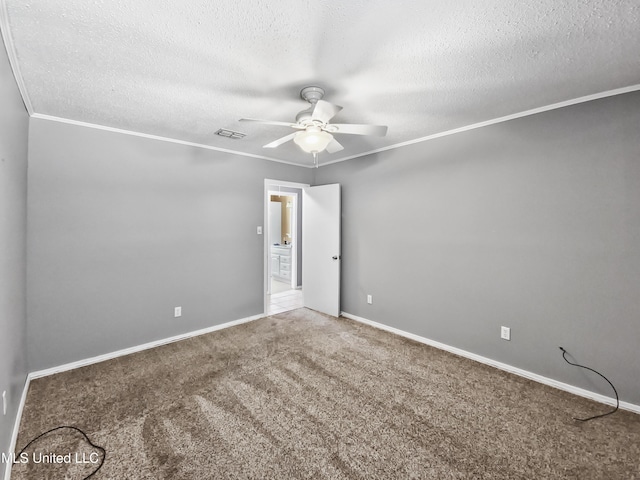 1334 Diller Rd, Ocean Springs, MS 39564 - unfurnished room with ceiling fan, carpet flooring, crown molding, a textured ceiling, and baseboards