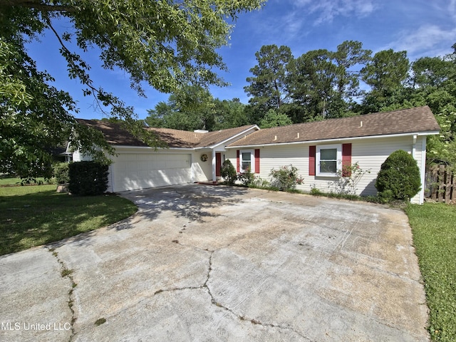 1334 Diller Rd, Ocean Springs, MS 39564 - ranch-style home featuring a garage, a front yard, and driveway