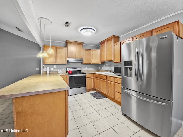 1334 Diller Rd, Ocean Springs, MS 39564 - kitchen with stainless steel appliances, under cabinet range hood, a peninsula, a sink, and light tile patterned floors