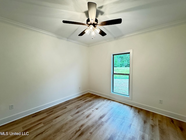 unfurnished room with light hardwood / wood-style flooring, ornamental molding, and ceiling fan