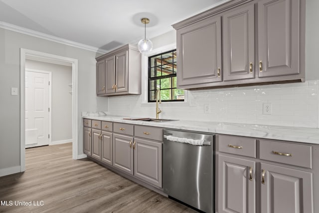 kitchen featuring stainless steel dishwasher, gray cabinetry, a sink, ornamental molding, and light wood-type flooring