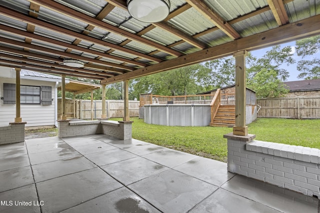 view of patio with stairs and a wooden deck