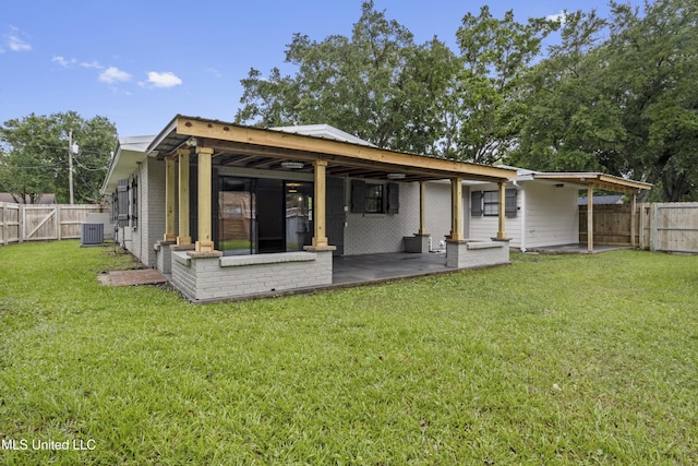 rear view of property featuring a patio, a gate, and cooling unit
