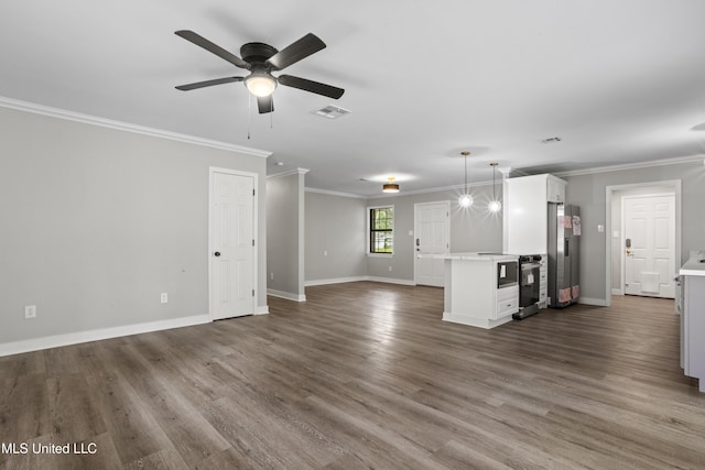 unfurnished living room featuring ceiling fan, baseboards, wood finished floors, and crown molding