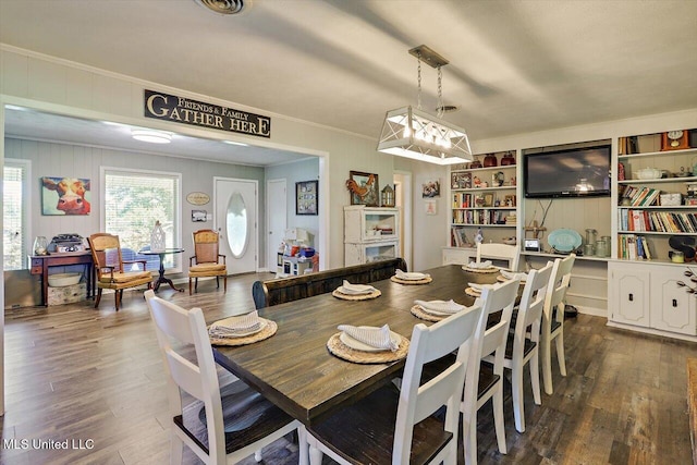 9414 Hillsboro Ludlow Rd, Lena, MS 39094 - dining space with dark wood-style flooring and ornamental molding