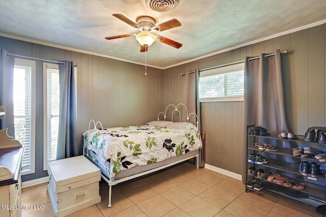 9414 Hillsboro Ludlow Rd, Lena, MS 39094 - tiled bedroom featuring ornamental molding, baseboards, and ceiling fan