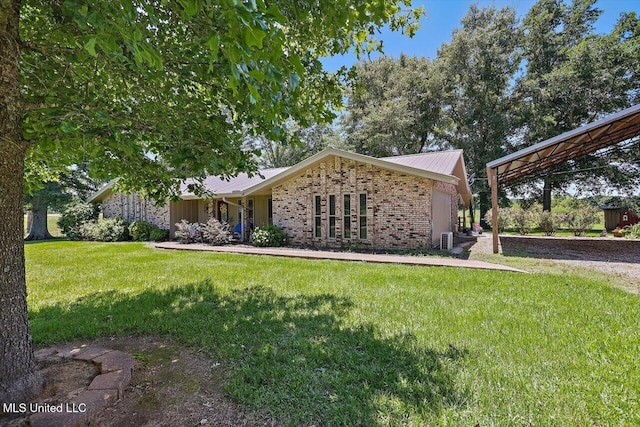 9414 Hillsboro Ludlow Rd, Lena, MS 39094 - view of front of property featuring brick siding, a front yard, and central AC unit