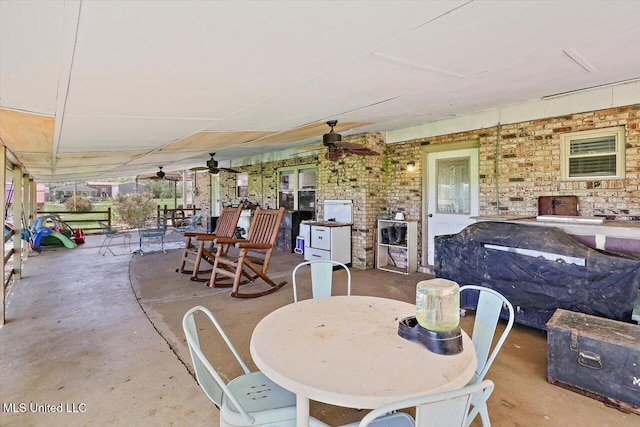9414 Hillsboro Ludlow Rd, Lena, MS 39094 - view of patio / terrace featuring outdoor dining space and a ceiling fan