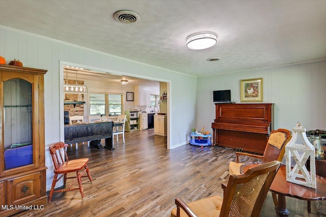 9414 Hillsboro Ludlow Rd, Lena, MS 39094 - living area with wood finished floors and ornamental molding