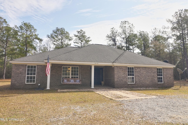 single story home with a front yard