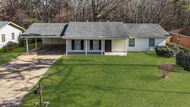 ranch-style home with covered porch, a front lawn, and a carport