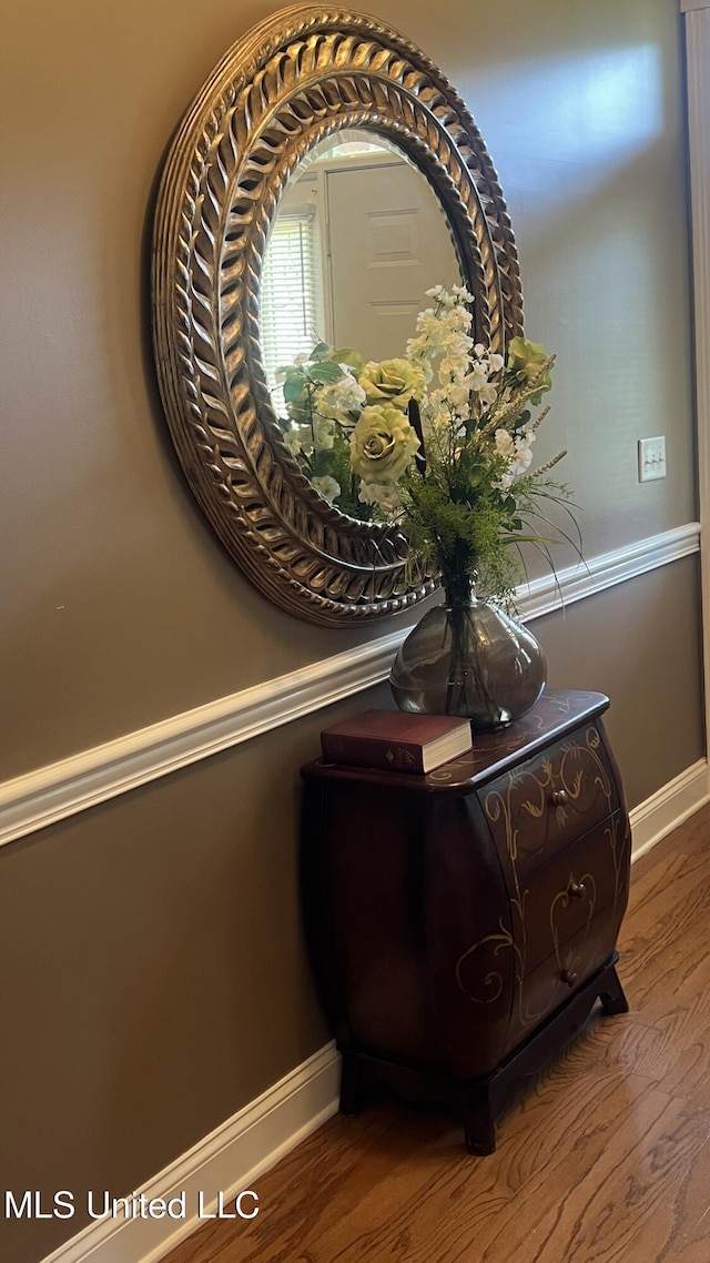 detailed view of wood finished floors and baseboards