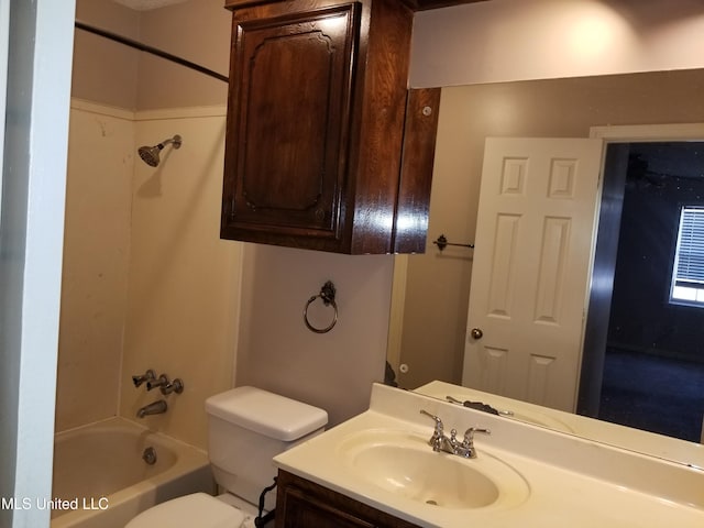 full bathroom with toilet, vanity, and shower / bathtub combination