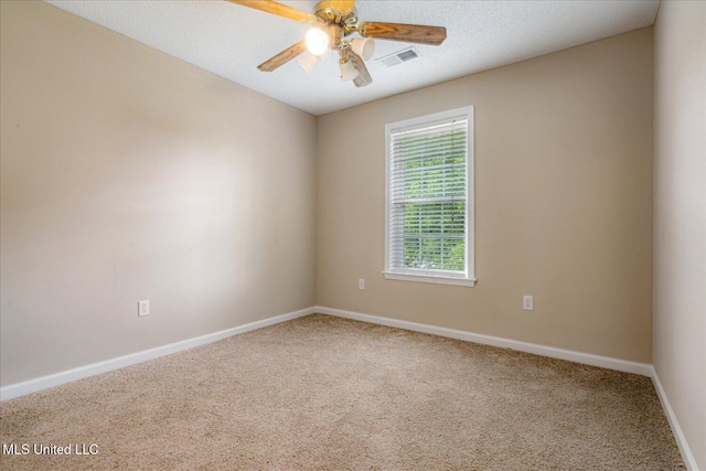 9015 Champlain Dr, Olive Branch, MS 38654 - spare room with carpet floors, ceiling fan, and baseboards