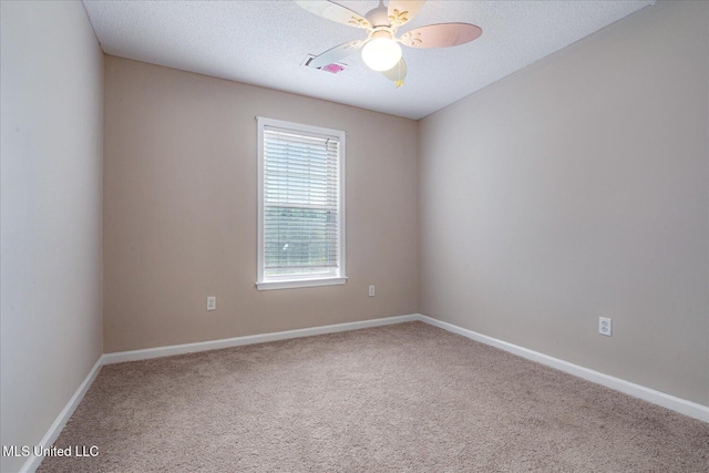 9015 Champlain Dr, Olive Branch, MS 38654 - carpeted spare room featuring baseboards, ceiling fan, and a textured ceiling