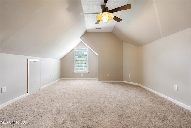 9015 Champlain Dr, Olive Branch, MS 38654 - additional living space featuring ceiling fan, lofted ceiling, carpet, and baseboards