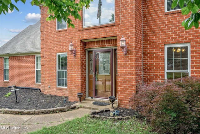 9015 Champlain Dr, Olive Branch, MS 38654 - entrance to property with brick siding and a shingled roof