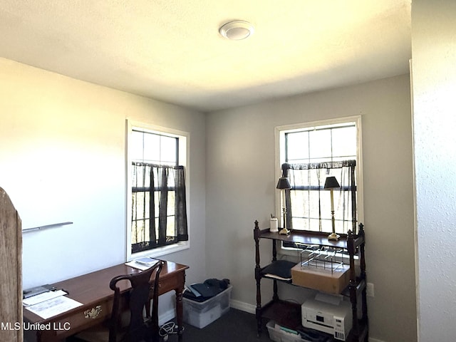 office area with baseboards and a wealth of natural light