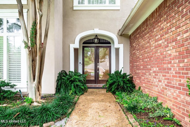 628 Kinsington Ct, Ridgeland, MS 39157 - view of exterior entry with french doors and stucco siding