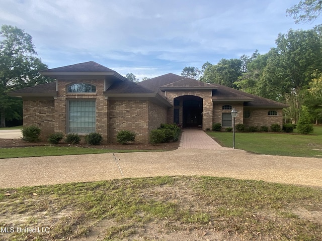 view of front of home with a front yard