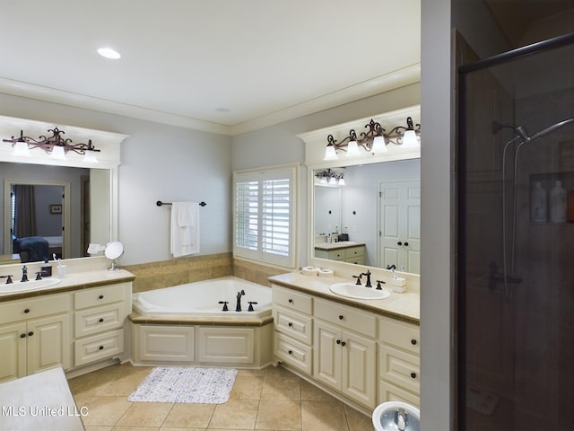 bathroom with vanity, tile patterned floors, and separate shower and tub