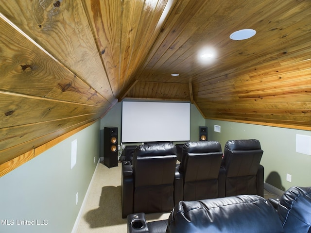 home theater with carpet floors, vaulted ceiling, and wooden ceiling