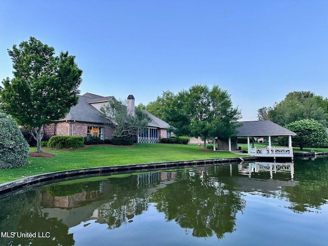 exterior space with a water view