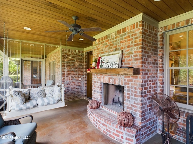 view of patio / terrace with an outdoor brick fireplace and ceiling fan