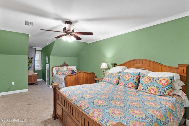 carpeted bedroom with lofted ceiling, ceiling fan, and crown molding