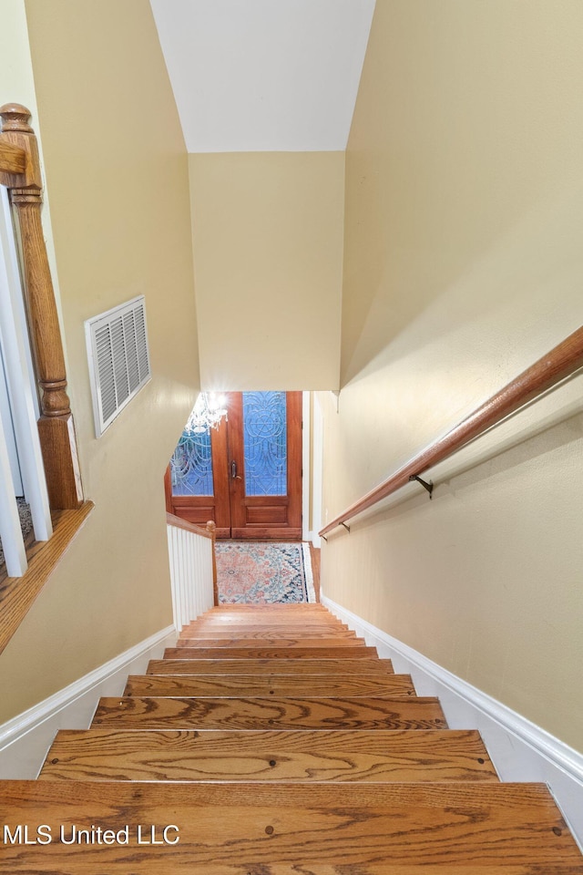 stairs with a towering ceiling