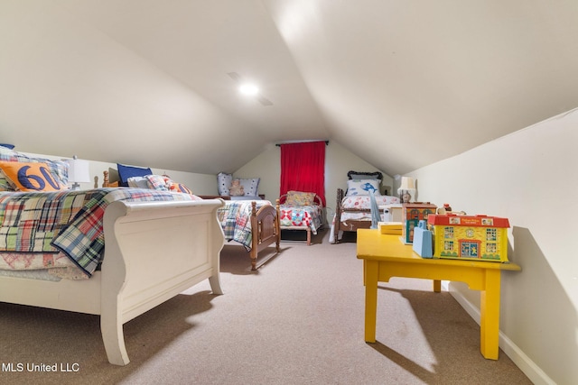 bedroom featuring carpet floors and lofted ceiling