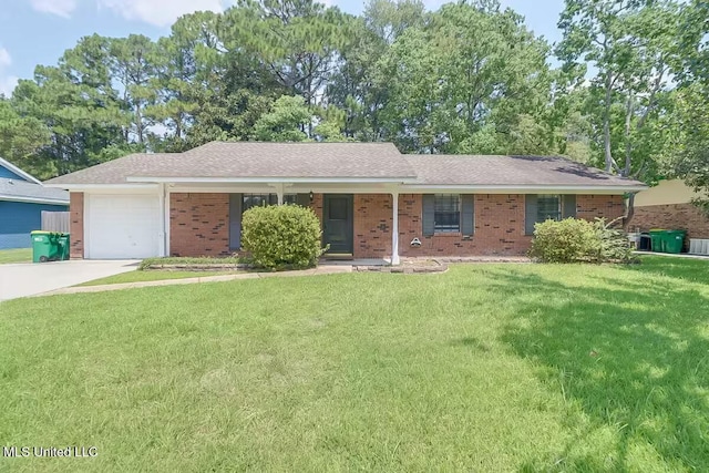 6512 Mayfair St, Ocean Springs, MS 39564 - single story home with a garage, a front yard, concrete driveway, brick siding, and roof with shingles